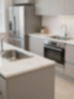 communal Modern kitchen with gray cabinets, island, and stainless steel appliances