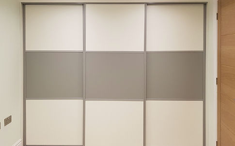 Made-to-measure sliding wardrobe doors fitted in a Watford bedroom