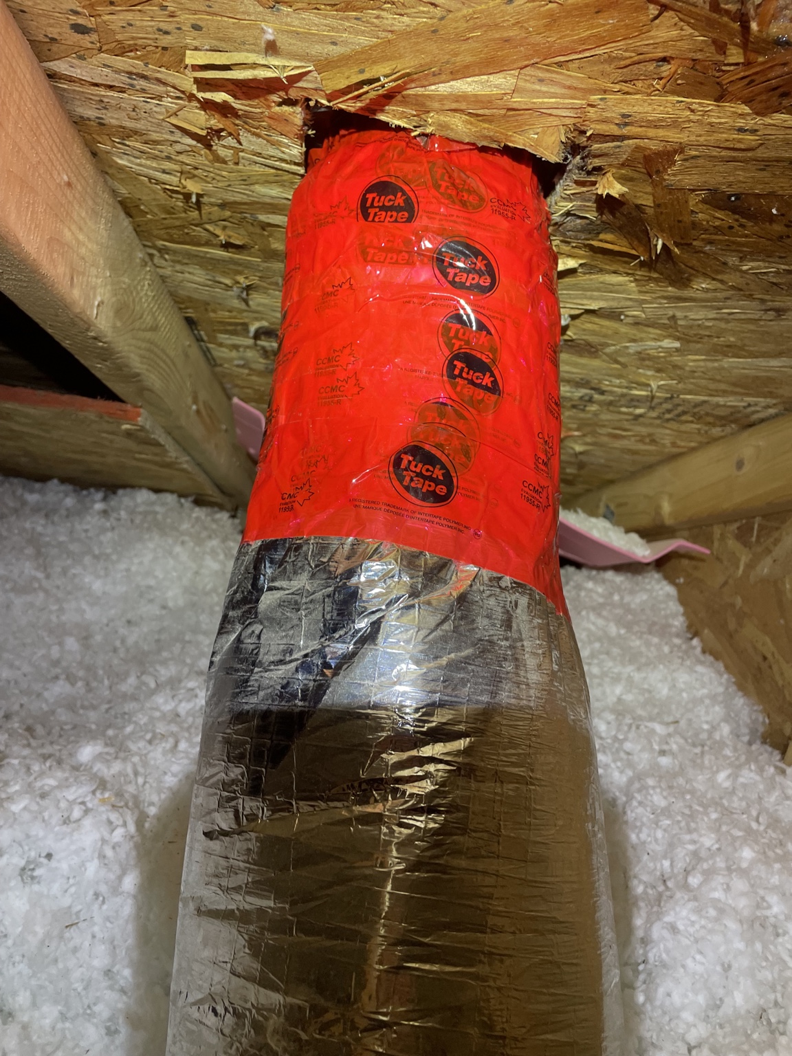 Insulated bathroom exhaust duct at a roof penetration