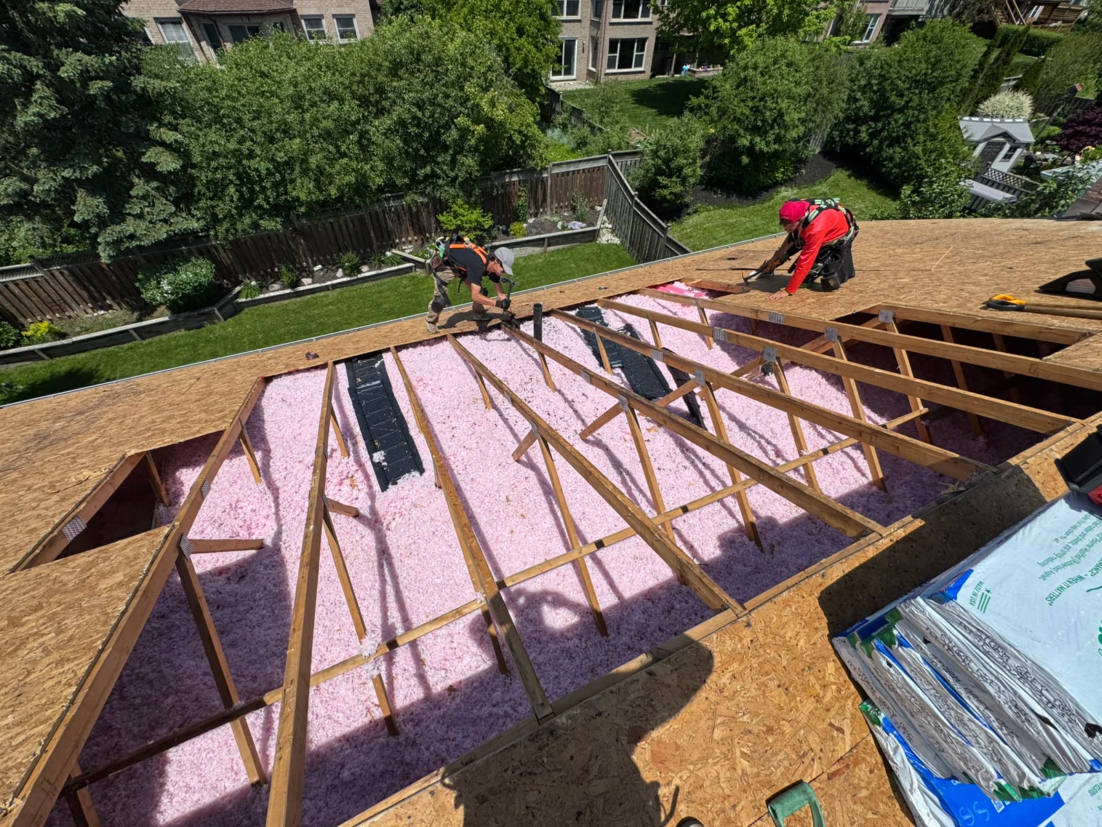 Attic insulation and framing during roof-deck access