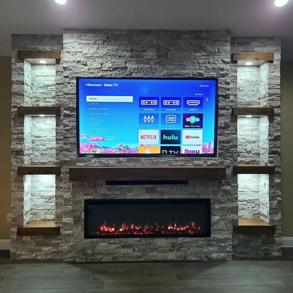 stacked-stone-media-wall-with-floating-shelves