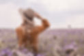 beautiful-young-woman-in-hat-in-lavender-field-blooming-flowers.jpg