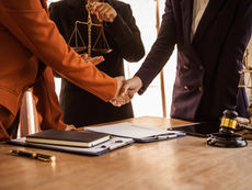 Shaking hands with a Detroit Criminal Defense Attorney