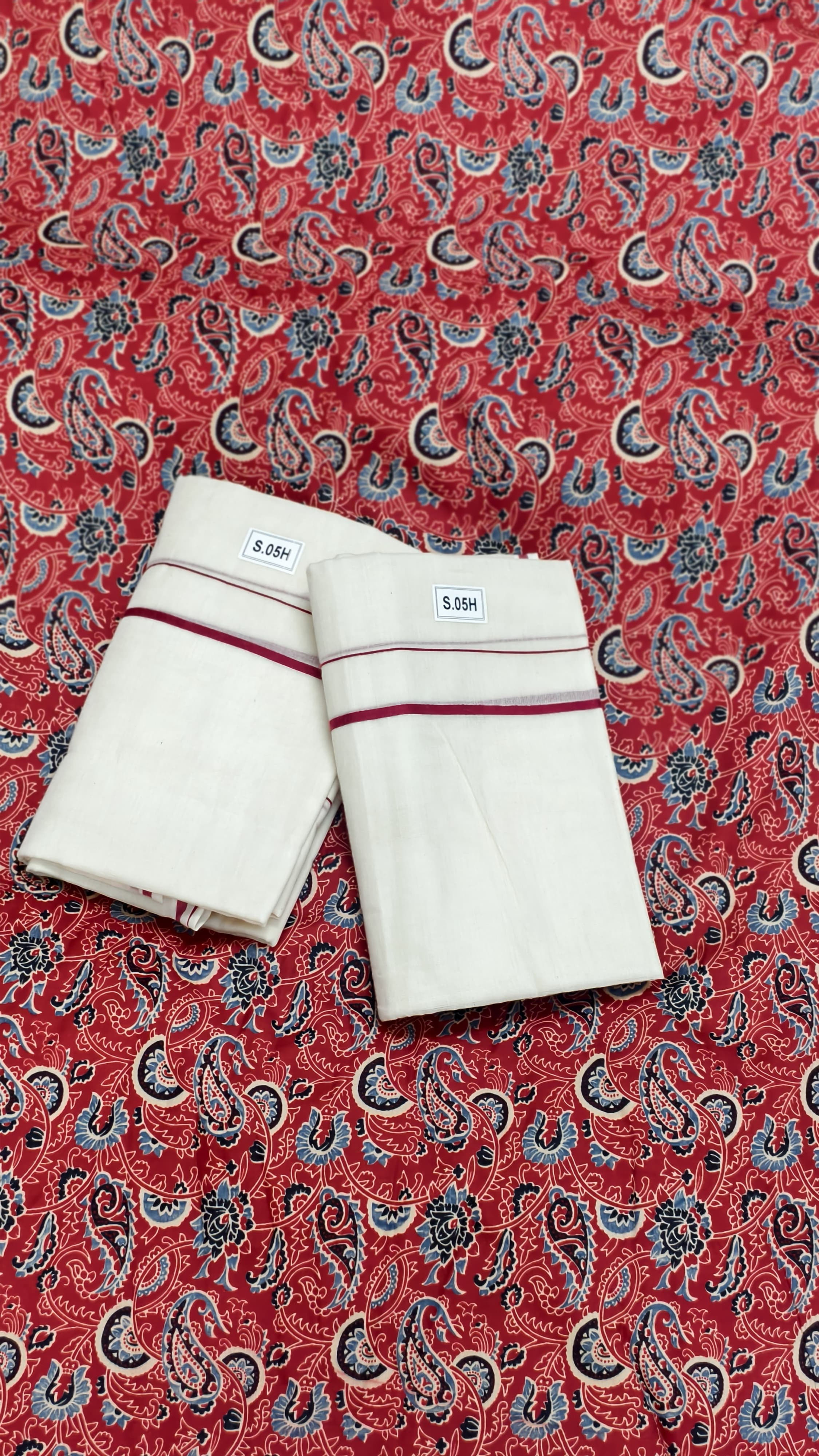 Puliyirakara set mundu