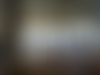 Group of people walking around an indoor track