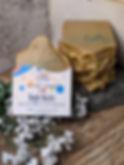 Thumbnail: Close-up of Baby Bliss handmade soap bar by West Five Story, showing the 178g 6.28oz weight on the label against a rustic woo