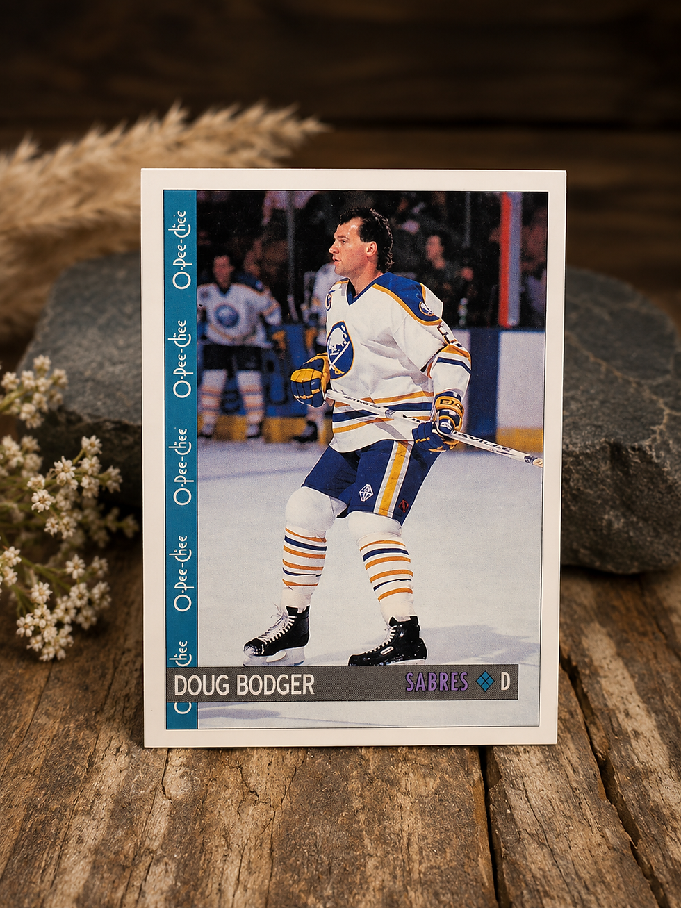 Product photography displaying the front and back of the 1992-93 O-Pee-Chee Doug Bodger #146 hockey card, leaning upright aga
