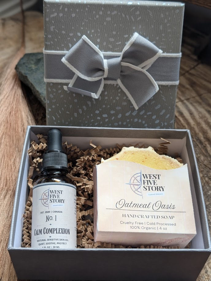 A premium West Five Story gift box, open to reveal a bottle of No. 1 Calm Complexion Natural Sensitive Skin Oil and a bar of