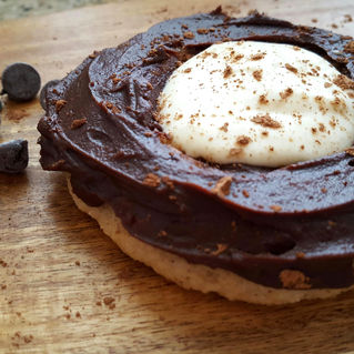 Low carbs, Sugar Free, & Keto Doughnuts filled with French Pastry Cream & dipped in Ganache