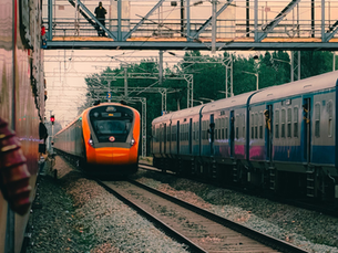 A Vande Bharat Express train of the Indian Railway overtaking other trains.