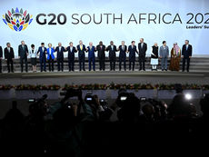 Symbolic representation of geopolitical competition with global powers facing off on a strategic chessboard.