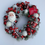 Thumbnail: Handmade Red and White Snowy Santa Wreath