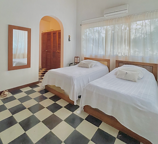HABITACION 3 CALIPSO BEACH HOUSE PLAYA BLANCA SAN ANTERO.png