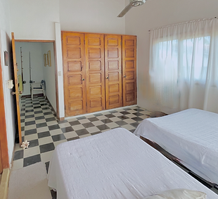 HABITACION 2 CALIPSO BEACH HOUSE PLAYA BLANCA SAN ANTERO.png