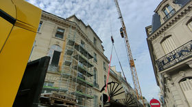 Livraison d’un escalier en colimaçon au siège de Free à Paris