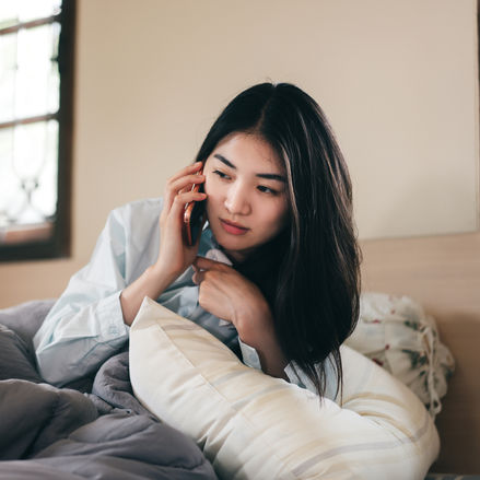 girl speaking to Angelika over the phone 