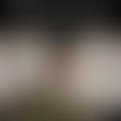 photo of young James Baldwin from the mid-upper-arms up in a brown sweater with white shirt color peeking out the top with quote about imposed identity and its impact on mental health.