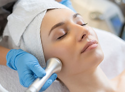 young-woman-lying-cosmetologist-s-table-rejuvenation-procedure-cosmetologist-take-care-abo