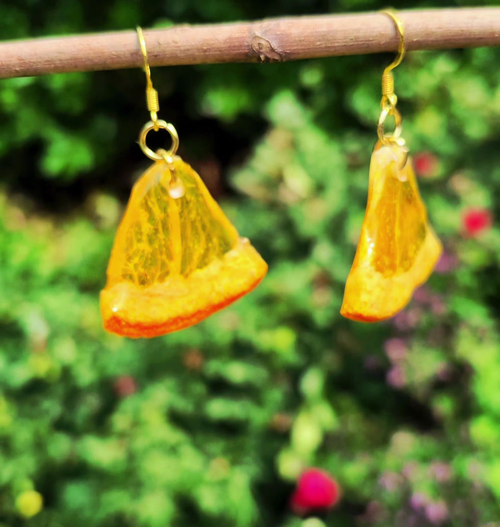 Thumbnail: video of real orange slide earrings