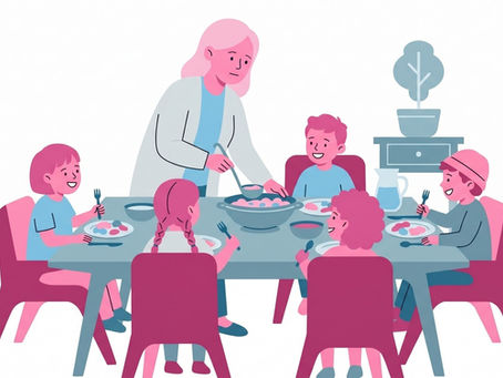 a lady feeding four children at a table