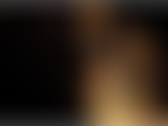 Hand holding a medal