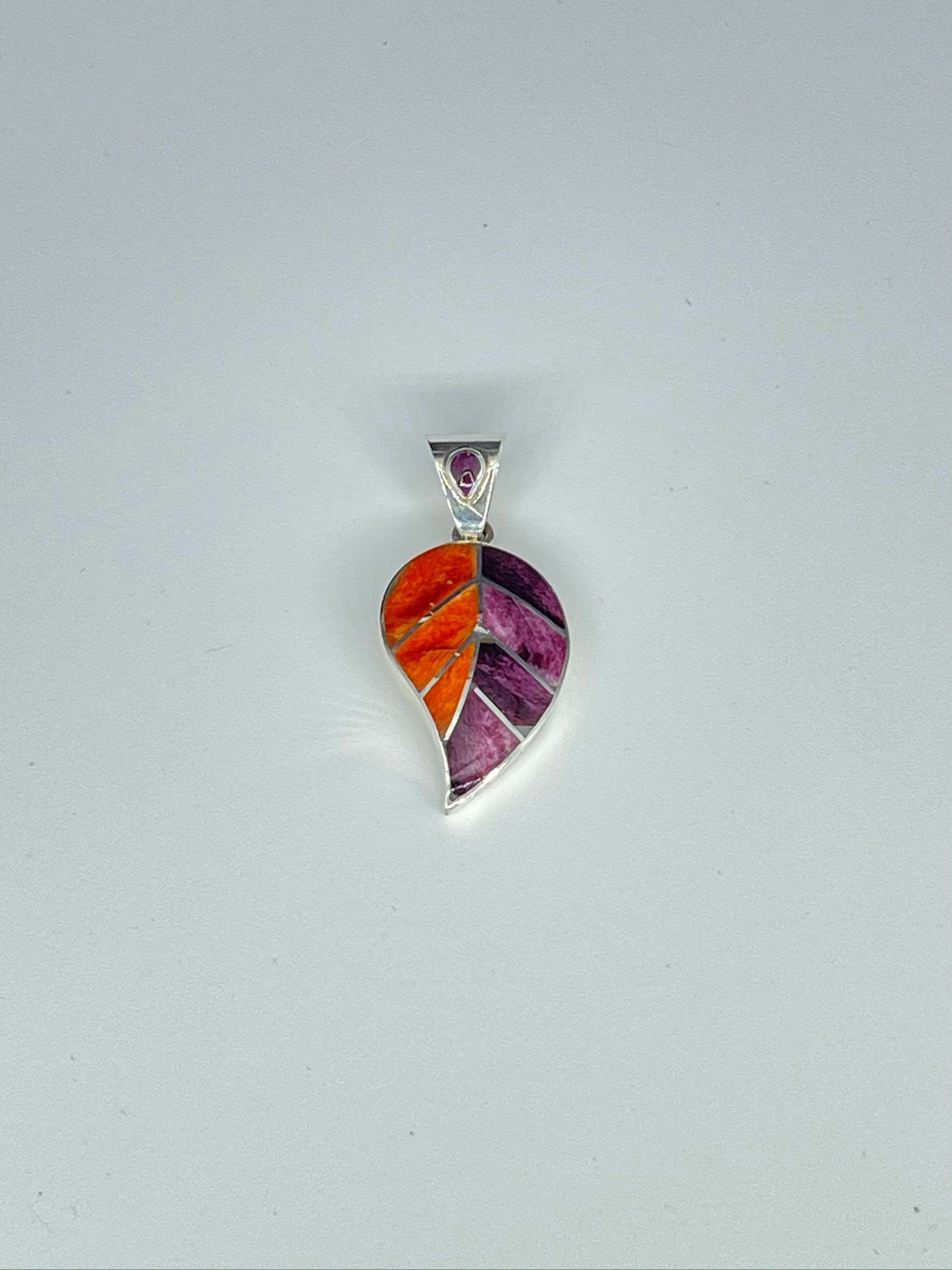 Dije en plata 950 con piedras semipreciosas