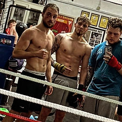 three men during training session at SS8 Fight School