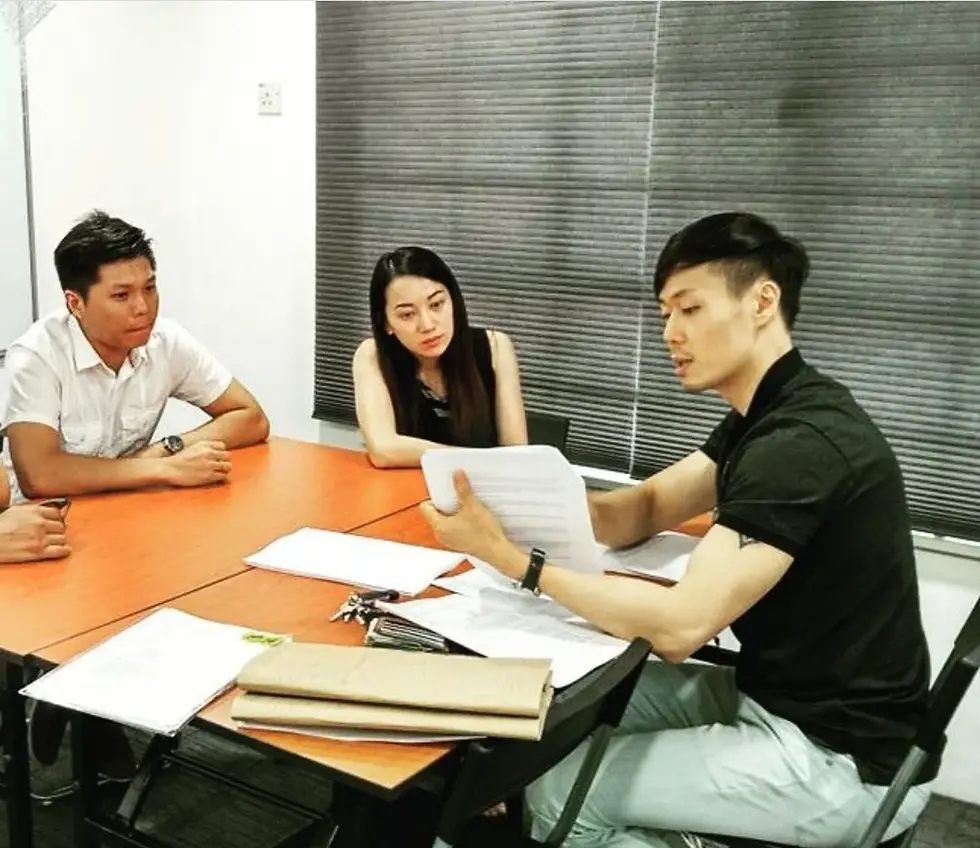 rule and co litigation lawyers sitting down with clients during a consultation session