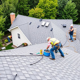 roofing solutions company workers around a house .jpg