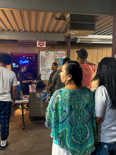 People in line for Charlie's Taco Truck in Phoenix, Arizona.