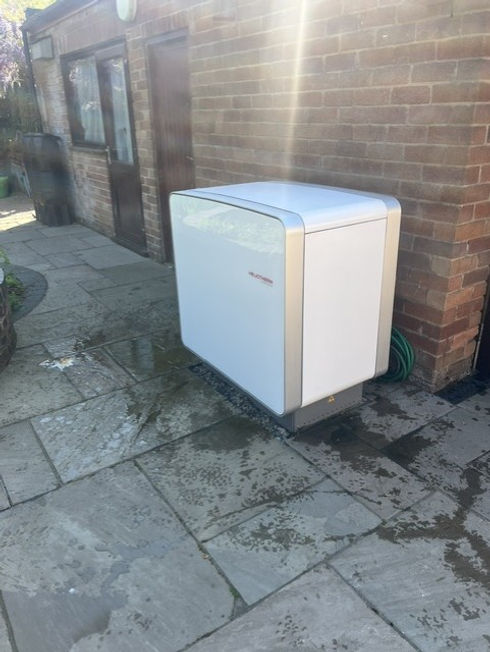 Professionally installed R290 ground source heat pump system at the rear of a Cheshire home