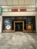 Storefront with temporary window graphics for Level 5 Entertainment, CHA, YOGA