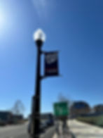Washington Nationals banner installation on a street lamp