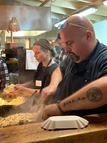 Chef vor den Pfannen