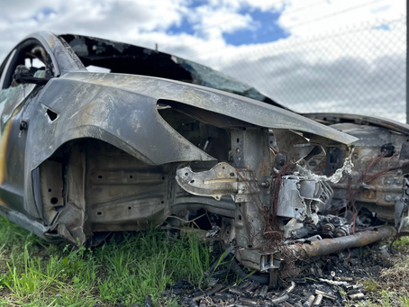 Burnt out electric vehicle for fire investigation