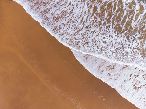 Orilla de la playa de Luanco