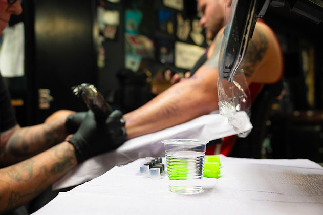 tattoo school tattoo artist doing a tattoo