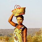 Portrait of malagasy woman with tradytional mask on the face.jpg