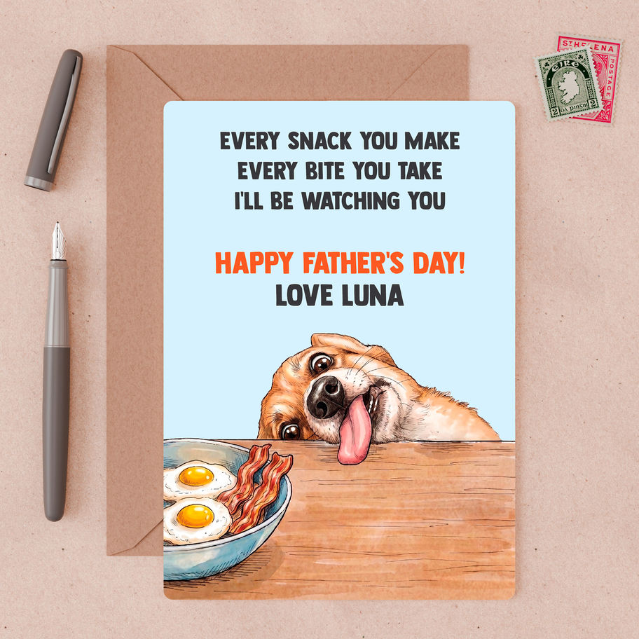 Dog dad holding funny personalised Father's Day card from his pet with big smile on face