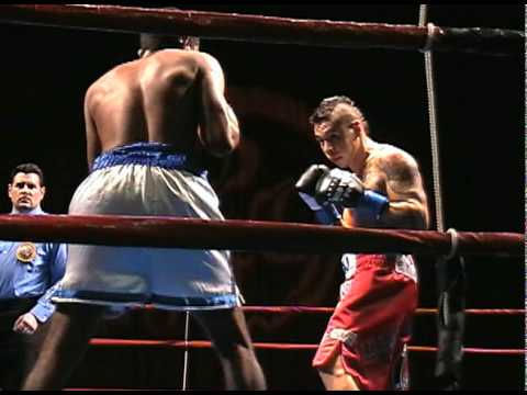 Boxers training in the ring during one-on-one boxing coaching