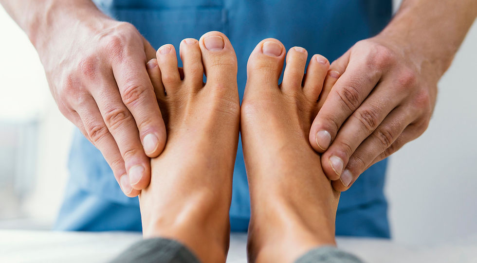front-view-male-osteopathic-therapist-checking-female-patient-s-toes.jpg