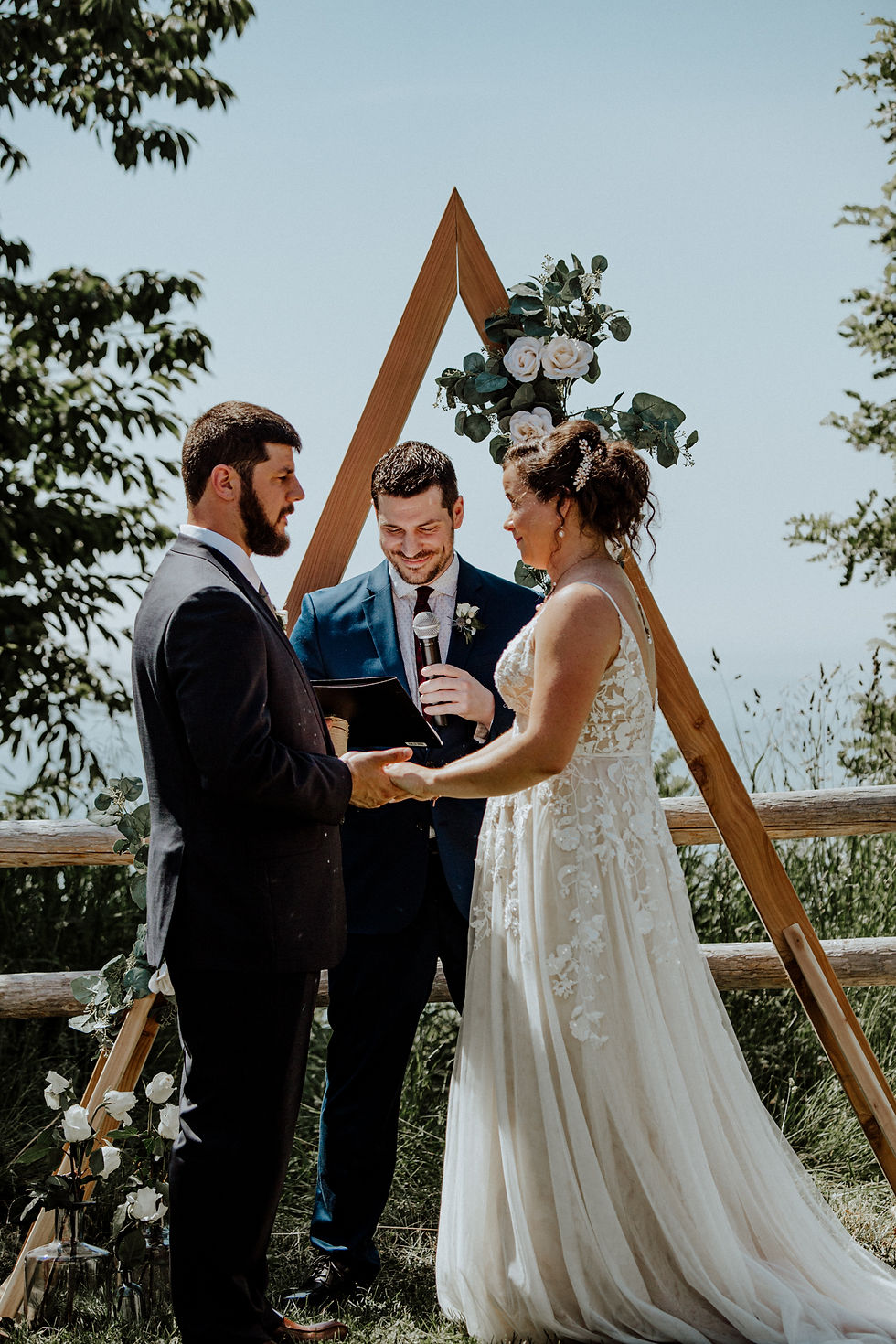 Wedding at Orchard Beach State Park by Detroit wedding photographer Little Blue Bird Photography in Manistee, Michigan