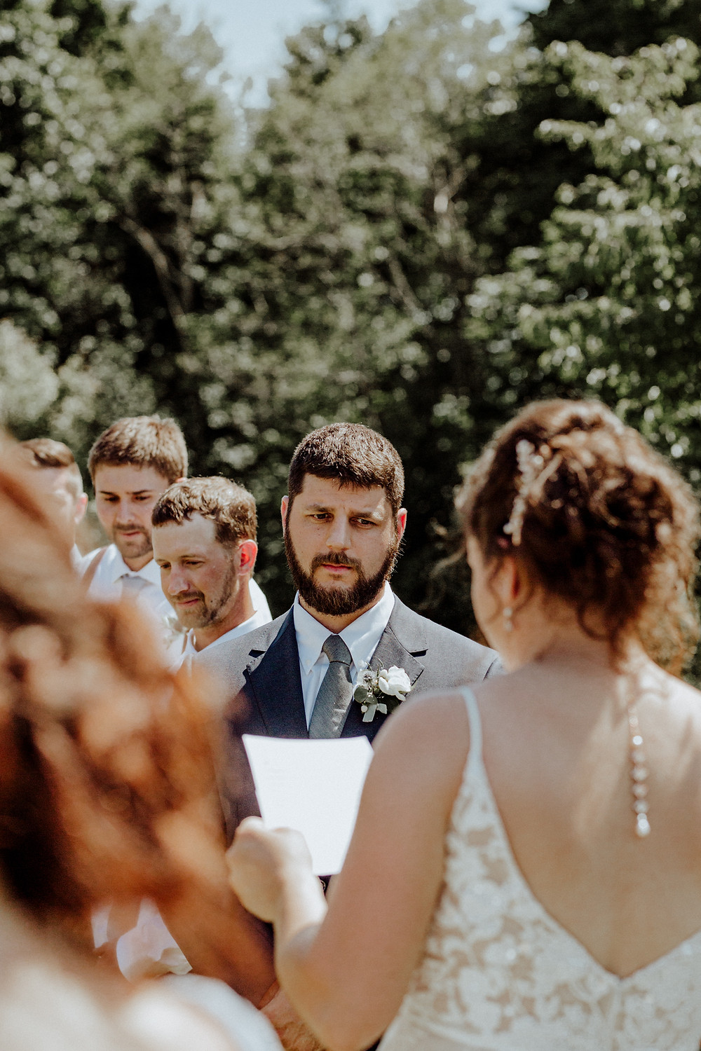 Wedding at Orchard Beach State Park by Detroit wedding photographer Little Blue Bird Photography in Manistee, Michigan