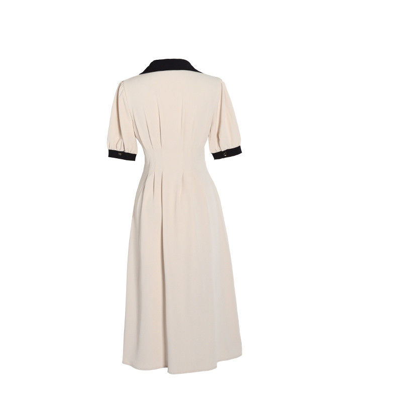 Thumbnail: Retro 1940s style black and white dress with pleats and collared.