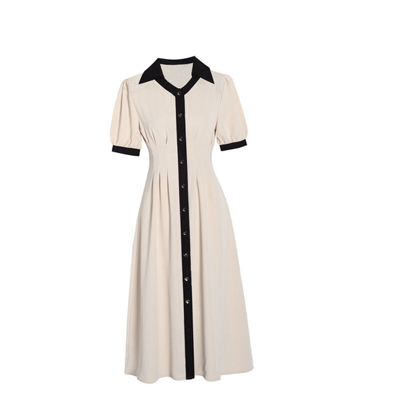 Thumbnail: Retro 1940s style black and white dress with pleats and collared.