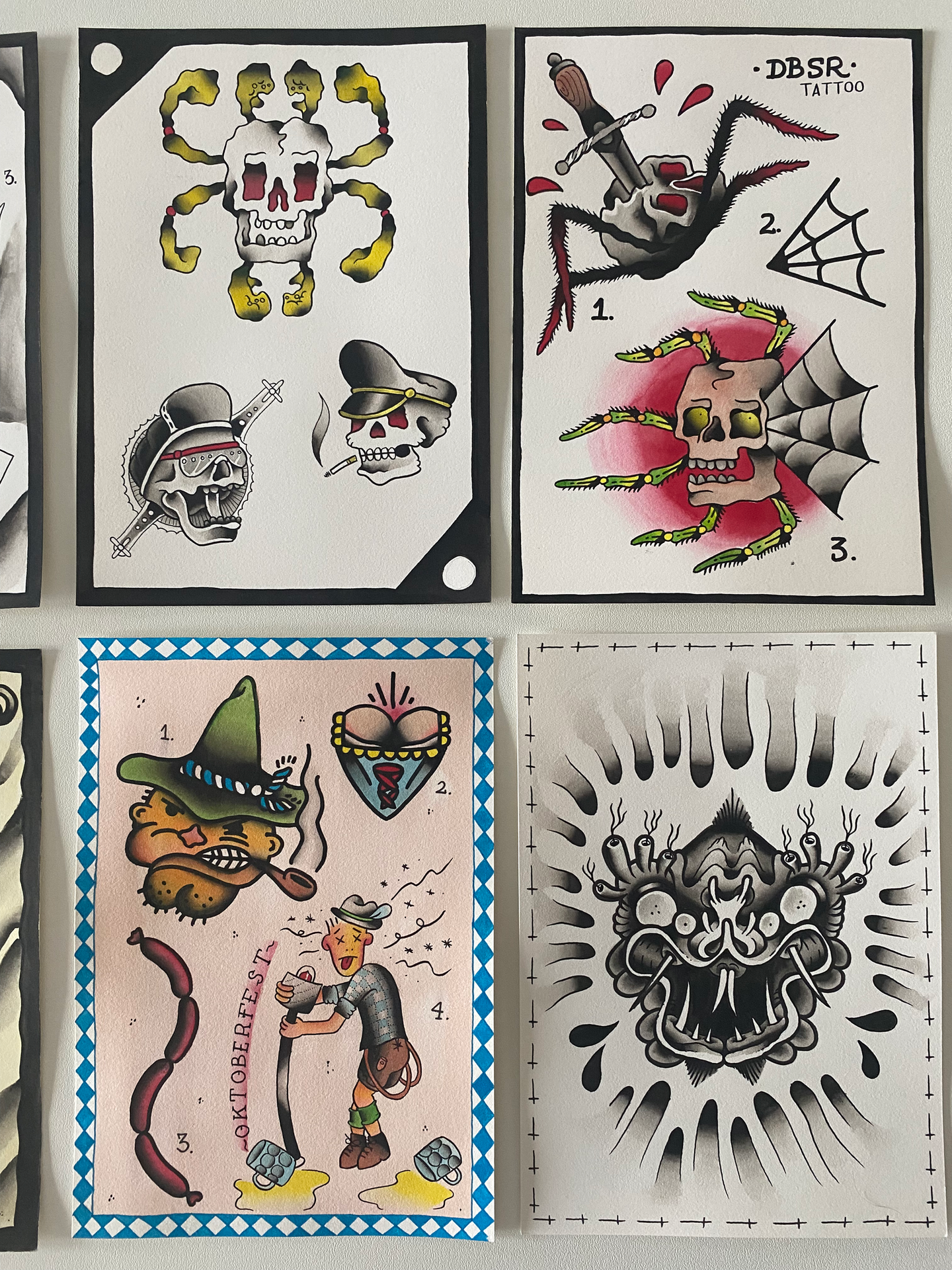 tattoo flash sheet with many designs