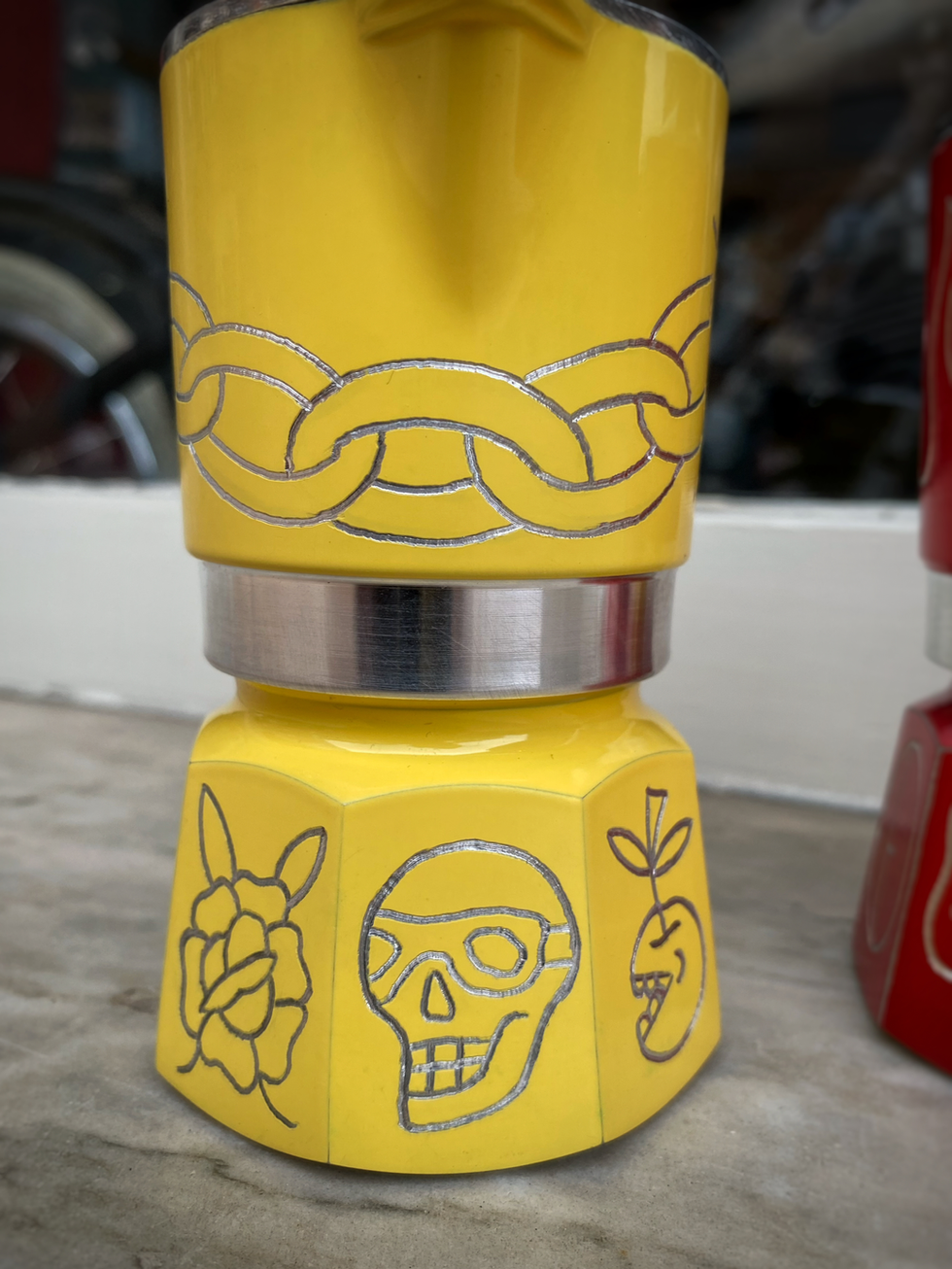 Bialetti coffee machine engraved with traditional tattoo motifs