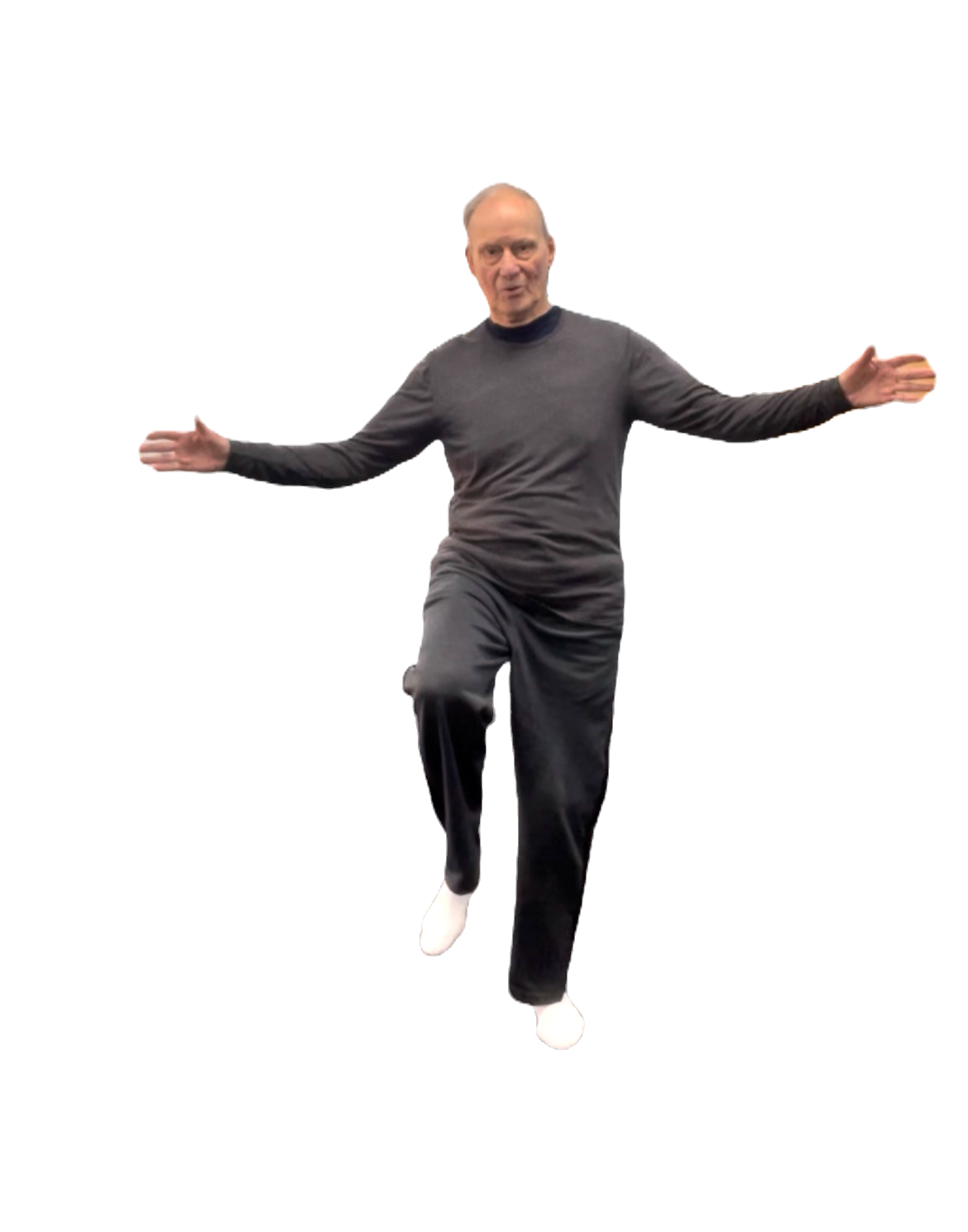 Mature man balancing on one foot