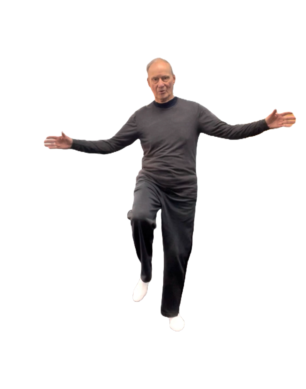 Mature man balancing on one foot