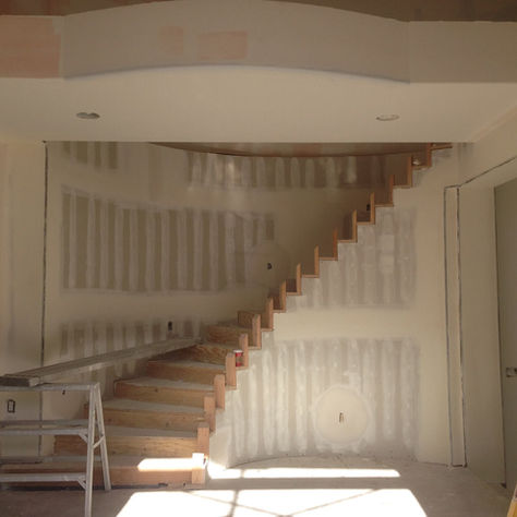Drywall in a radius stairway